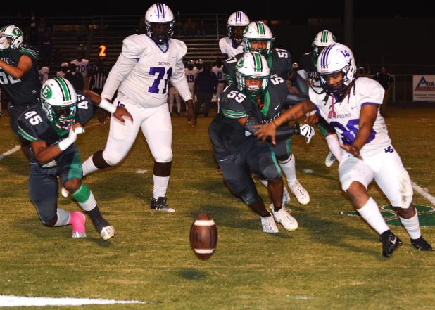 Eunice defenders recover a LaGrange fumble.