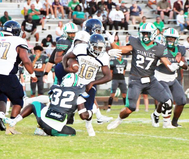 Eunice High’s Nicholas Gabriels tackles Avoyelles running back Decareyn Sampson.