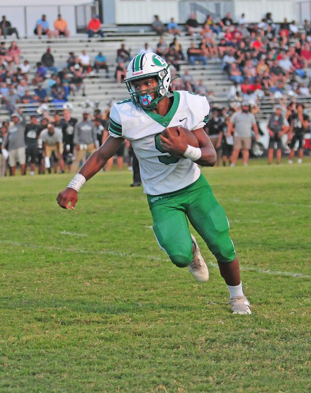 Eunice High’s Bryan Allen breaks loose for a good run against Northwest. (Photo by Tom Dodge)