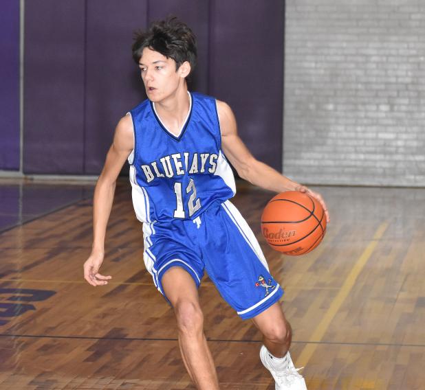 St.. Edmund’s John Landry scored 20 points against False River Academy. Landry also scored 13 points against Opelousas Catholic and 12 points against Catholic High of Pointe Coupee to earn the Eunice News Player of the Week honors. (Photo by Tom Dodge)