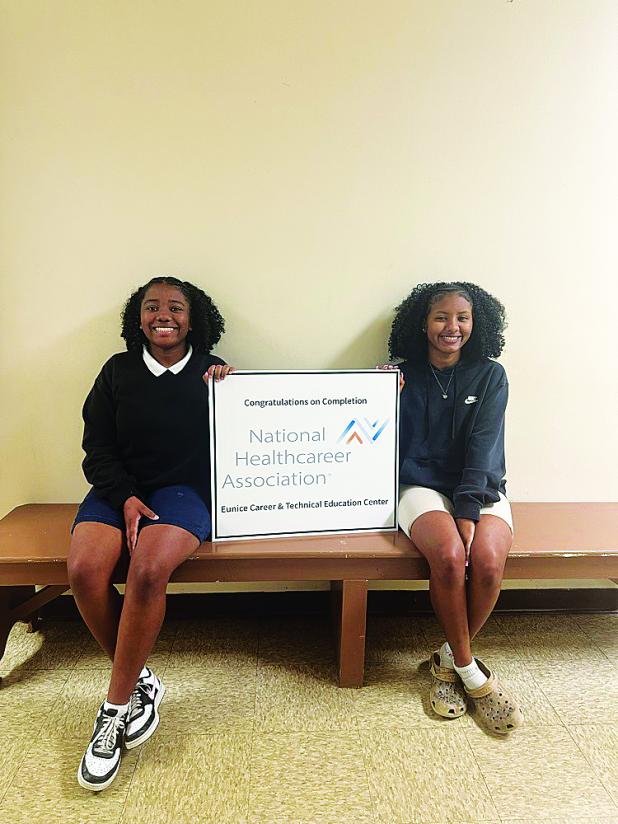 Eunice Career and Technical Education Center students (from left) Karlie Riggs and Ijah Mitchell recently achieved their Patient Care Technician certification from the National Healthcare Association. 