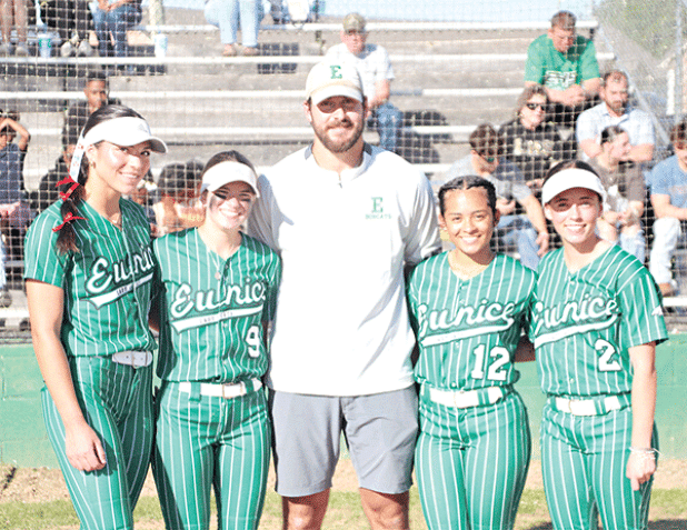 Eunice High honored seniors before the team’s 13-6 win over Leesville on Tuesday. From left, Brooklyn Darbonne, Aniylah Ned, head coach Trenon Trosclair, Savannah Tauzin and Ava Landreneau. (Photo by Rhett Manuel)
