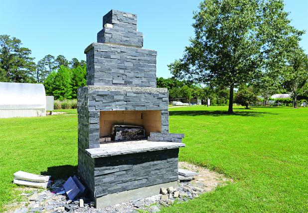 Features such as this outdoor fireplace at the LSU AgCenter Hammond Research Station are called hardscapes. They can provide both aesthetic and practical benefits. (Photo by Olivia McClure/LSU AgCenter)