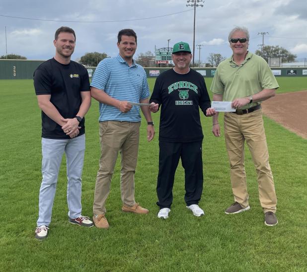 From left are Stefan Frey, Cole Frey, Eunice High head baseball coach Scott Phillips and Randy Young.