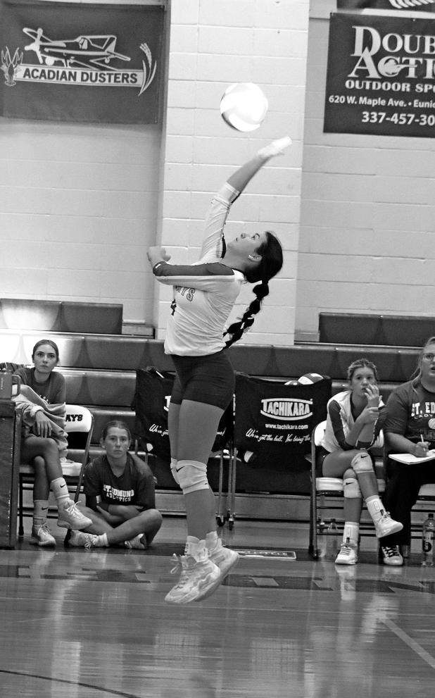 St. Edmund High School volleyball player Halle Cart sends the ball over the net during a recent game. The volleyball team won three sets in a row, 25-14, 25-17, and 25-17. (Photo by Amy Myers)