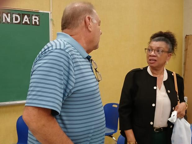 Kyle Boss and Lucretia Hertzock after board meeting
