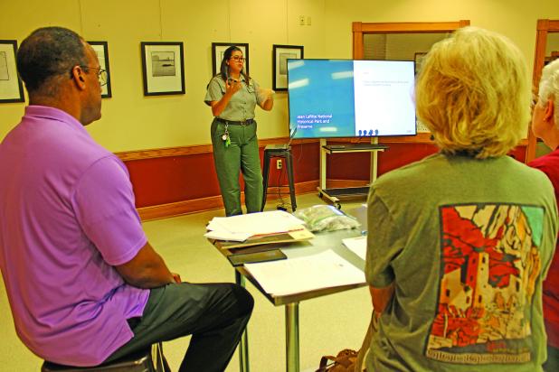  Laura McDonald, park ranger at the Prairie Acadian Cultural Center, gave a re-introduction of the center, which reopened around Mardi Gras earlier this year after being closed for about five years. During those years, the building was outfitted with a new air conditioning system and a new roof. (Photo by Claudette Olivier)