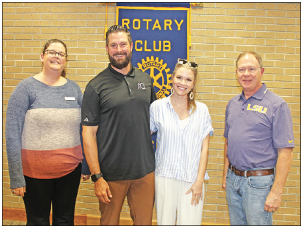 The Rev. Chris Frye, pastor of New Hope Church, was the guest speaker Wednesday at the Eunice Rotary Club meeting. From left are Rotary Club President Erika Fontenot, Frye; Megan Frye, wife of Rev. Chris; and Jerome Fontenot, Rotarian. Fontenot invited Rev. Frye as a guest speaker. (Photo by Myra Miller)