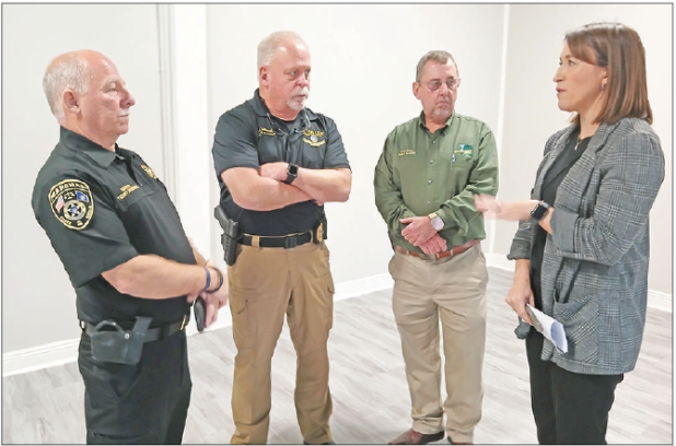 Eunice City Marshal Terry Darbonne, left, Eunice Police Chief Kyle LeBouef, St. Landry Parish President Jessie Bellard and Judge Laura Garcille talk during a press conference on Wednesday. A proposed nine-parish regional juvenile detention facility will be supported initially by a voter-approved 1-cent sales tax, Bellard said during the press conference.