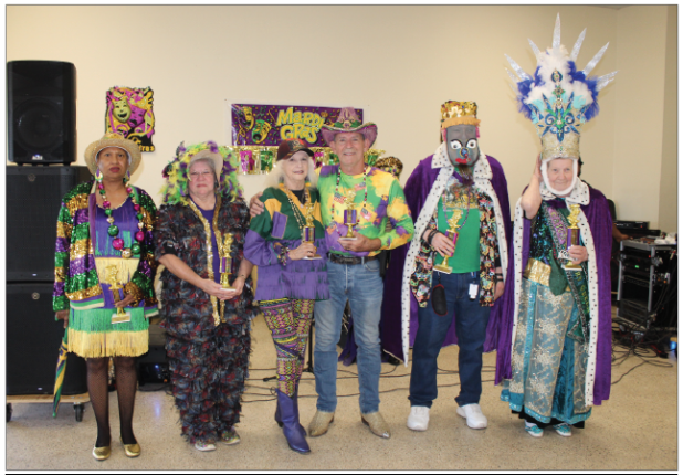 Judges were on hand at the annual COA Mardi Gras Dance held Monday to judge and name winners in different categories. From left are Peggy Marks as the Prettiest Costume and Stephanie Cormier won the Most Traditional Costume. The Best Female and Male Dancers award went to Shirley and Wallace Trahan; King crowned was Don Baggett; and winning Queen was Olita Bordelon. (Photo by Myra Miller)