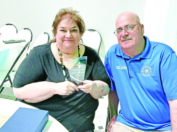 Yancey Fontenot, left, Eunice Community Health Center director, with St. Landry Parish Council member Timothy Lejeune. Fontenot was presented with the annual President’s Award by St. Landry Parish President Jessie Bellard. (Photo by Bobby Ardoin)