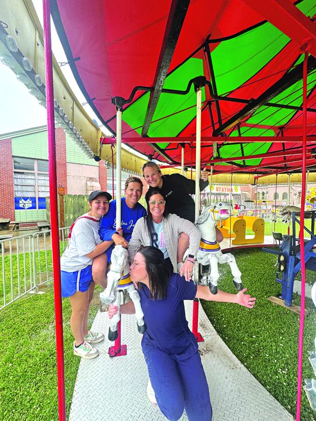 Rain or shine..St. Edmund Spring Fair goes on. (Photos by Rebecca Chaisson)