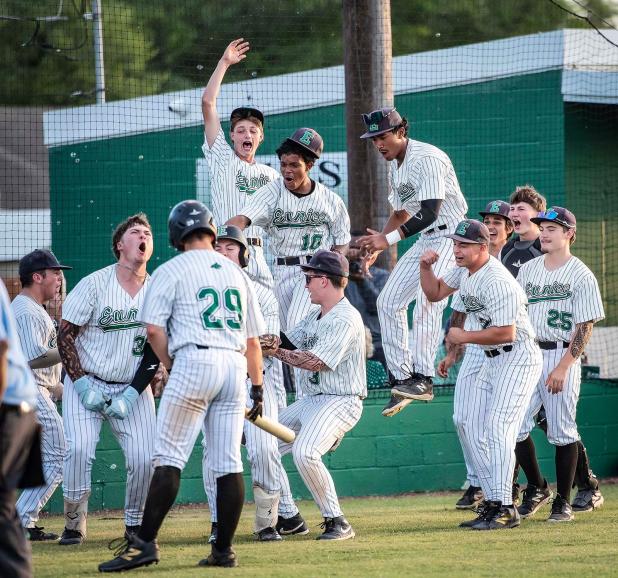 Eunice High team celebrates a playoff victory Thursday evening in their home contest. (Photo by Dwight Jodon)