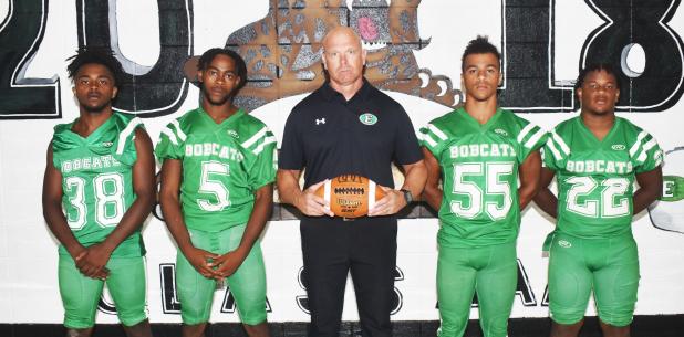 Eunice High defensive coordinator Dale Guillory, center, is joined by Paul Edwards, Jared Thomas, Jonathon McQuirter and Lathan Kennedy. 