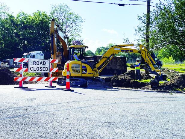 Contract workers on LA. 13 replacing cross drain. (Photo by Misty Gilley)
