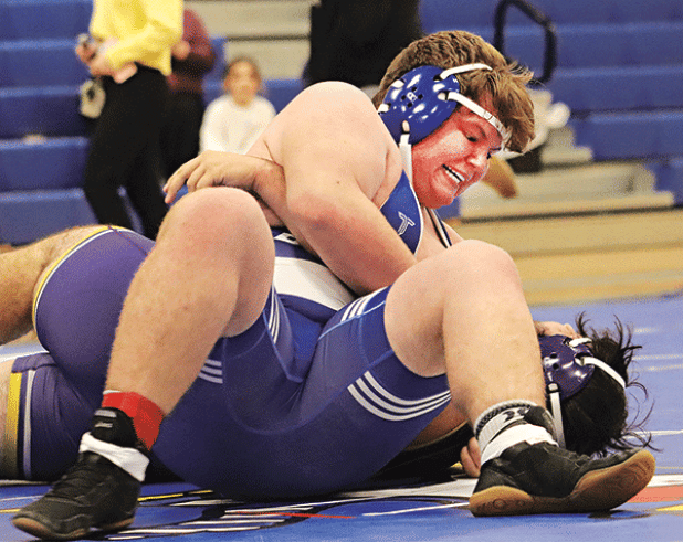 The Blue Jay Wrestling Club hosted a dual meet on Jan. 8 with Opelousas Catholic and Rayne High School. Through this meet they were able to gain more experience and prepared to travel to South Beauregard this weekend.  Charles Sonnier wins his match. (Photo by Amy Myers)