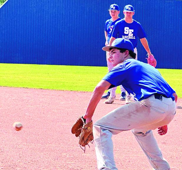 Blue Jays practice fundamentals on the field Tuesday. (Photo by Rebecca Chaisson)
