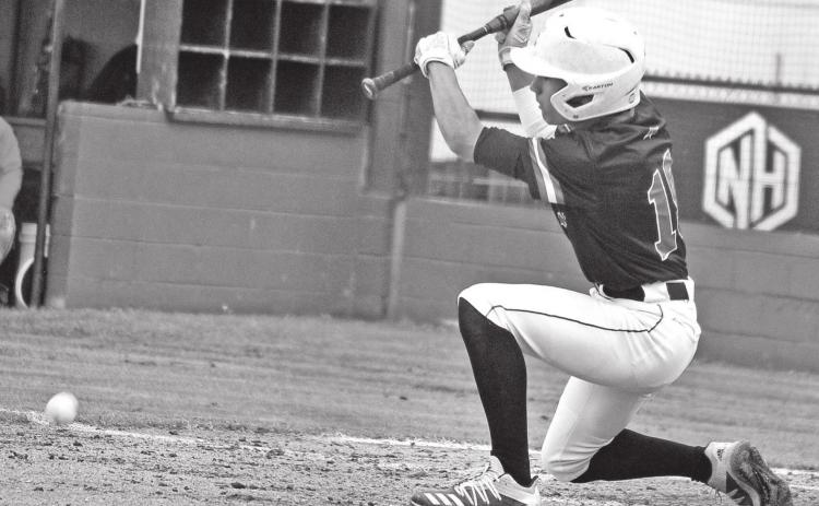 Eunice High’s Dru Phillips puts down a bunt against North Vermilion. (Photo by Tom Dodge)