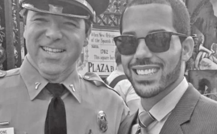 Rep. Matthew Willard, standing with a policeman in New Orleans, is one of the progressives in the Legislature. (Photo courtesy of Rep. Matthew Willard)