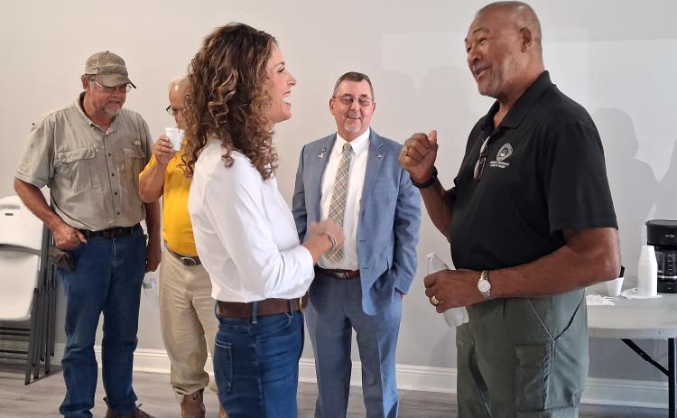 Letlow speaks with parish council member Jimmie Edwards.