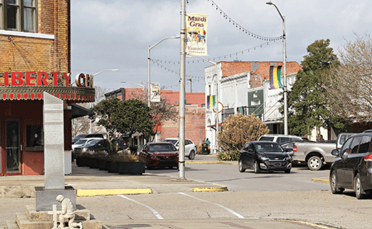 The Mardi Gras banners are up on 2nd Street in Eunice. Mardi Gras arrives on Feb. 21. (Photo by Harlan Kirgan)