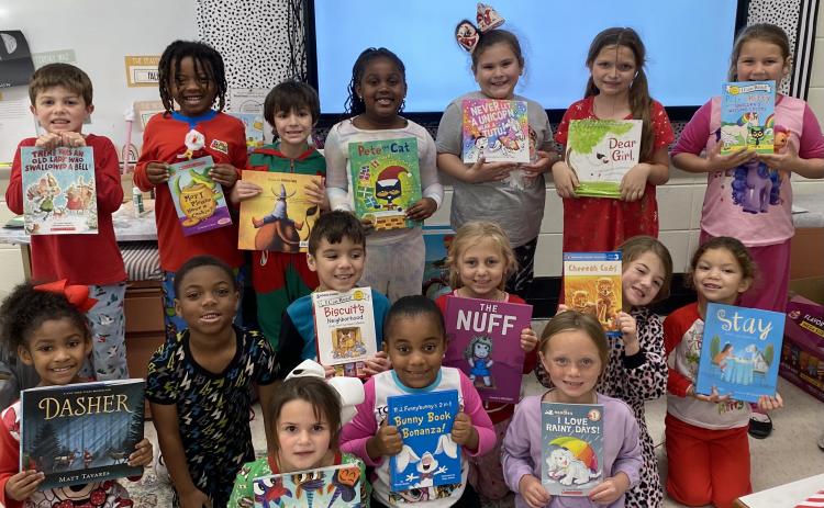 First graders at East receive books