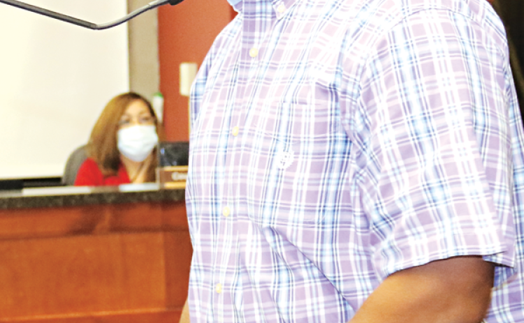 Herman Fuselier, St. Landry Parish Tourist Commission director, speaks at Wednesday’s Parish Council meeting in Opelousas. (Photo by Harlan Kirgan)