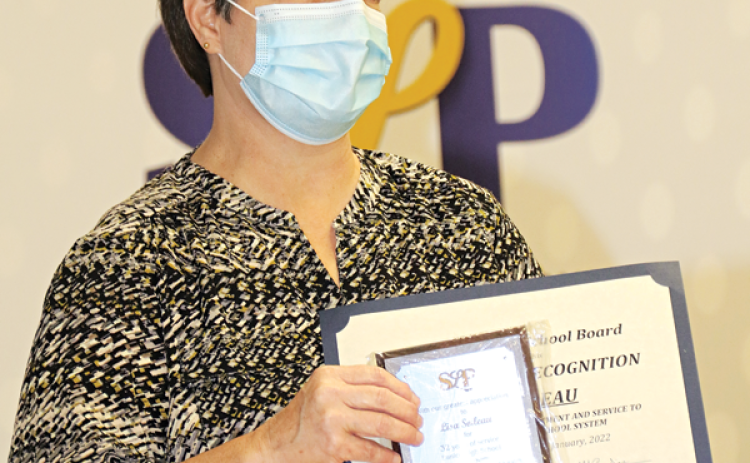 Eunice High School French teacher Lisa Soileau was honored at Thursday’s St. Landry Parish School Board on her retirement after serving more than 32 years. She has been a French teacher for more than 28 years at the high school. (Photo by Harlan Kirgan)