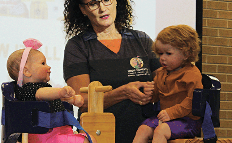 Jennifer Aguillard, a physical therapist and Board certified pediatric clinical specialist, was the guest speaker last week at the Eunice Rotary Club. She developed and patented Anni’s Activity Chair, an early intervention chair. (Photo by Myra Miller)