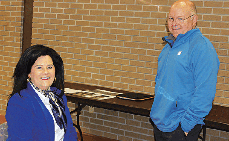 Nickie Toups, Eunice Manor administrator, is with Van Reed. Both are Eunice Rotary Club members. Toups spoke on Wednesday at the club’s meeting. (Photo by Myra Miller)