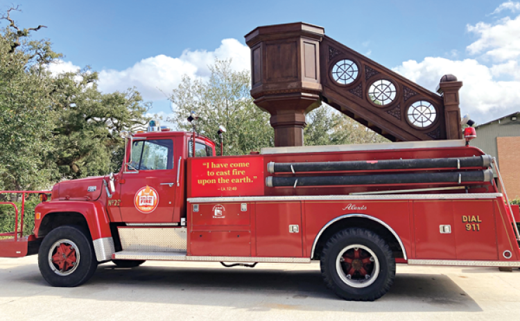 Fête-Dieu du Teche’s new Friar Truck which will be rolled out for the Bible Marathon. The retrofitted antique fire truck has been transformed into a mobile church with a built-in pulpit.