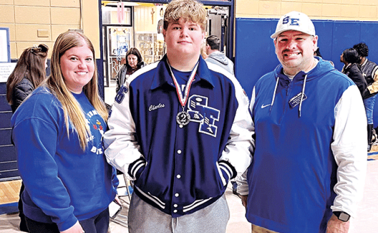 The Blue Jay’s Powerlifting team competed at the Sacred Heart Invitational on Saturday. SEH Junior, Charles Sonnier was second overall in the Super Heavy Weight division. He squatted 510 lbs, dead lifted 445 lbs. and broke the Super Heavy Weight meet record on bench at 305 lbs. He is with his sister, Laura Sonnier and Coach Corey Diaz. Photo by Dusty Sonnier)