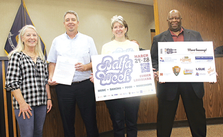 The 22nd annual Dewey Balfa Cajun & Creole Heritage Week will be held in Eunice in March.  The week was announced at the Eunice city council meeting on Tuesday with a proclamation.  From left, are Jeane Solis, executive director of Louisiana Folk Roots; Mayor Scott Fontenot; Jean Johnson, Louisiana Folk Roots Board member; and Herb Wiltz, Louisiana Folk Roots Board member. (Photo by Harlan Kirgan)