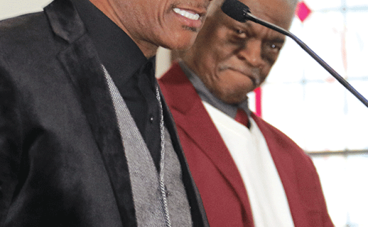 Eunice native Bishop Brian Stevens was the speaker at the Dr. Martin Luther King Jr. program on Sunday at New Zion Baptist Church. Behind Stevens is the Rev. Mack Frank. Stevens pastor of the Faith Hope Missionary Baptist Church in Abbeville. He and his wife, Ulander, are Eunice High School graduates. (Photo by Harlan Kirgan)