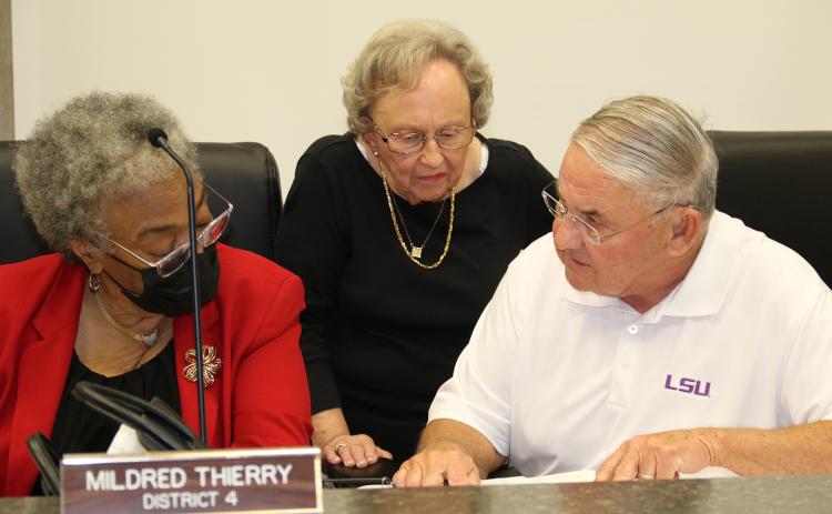 From left, Council members Mildred Thierry, Vivan Olivier and Haold Taylor review budget numbers at the Jan. 18 meeting. (Photo by Harlan Kirgan)