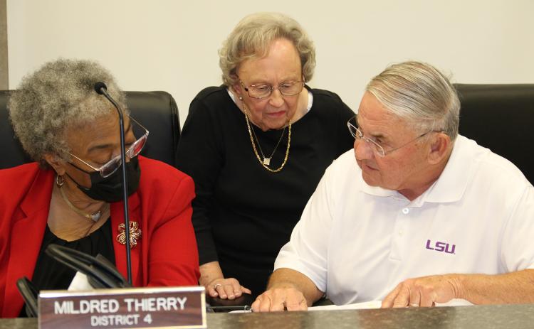 From left, Council members Mildred Thierry, Vivan Olivier and Haold Taylor review budget numbers at the Jan. 18 meeting. (Photo by Harlan Kirgan)