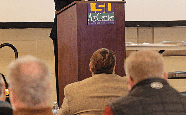 LSU AgCenter economist Michael Deliberto speaks during the Louisiana Agricultural Outlook Forum Jan. 10 at the State Evacuation Shelter near Alexandria. (Photo by Olivia McClure/LSU AgCenter)