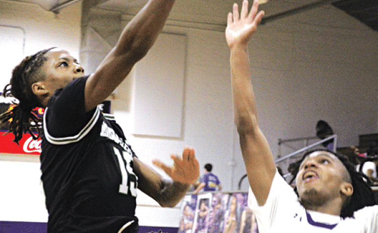 Senior forward Matthew Joseph goes up for a layup in the Bobcats’ win over the Rayne Wolves on Friday night. Joseph was one of four Eunice players who finished in double-digits in scoring. He had 10 points and the Bobcats were led by Brilon Ceasar’s 13 points. (Photos by Rhett Manuel)