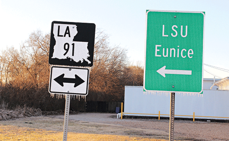 Icicles formed on road road signs after Monday’s rain quickly froze as temperatures plummeted in the afternoon. Morning lows on Tuesday and Wednesday dipped into the upper teens.  (Photo by Myra Miller)
