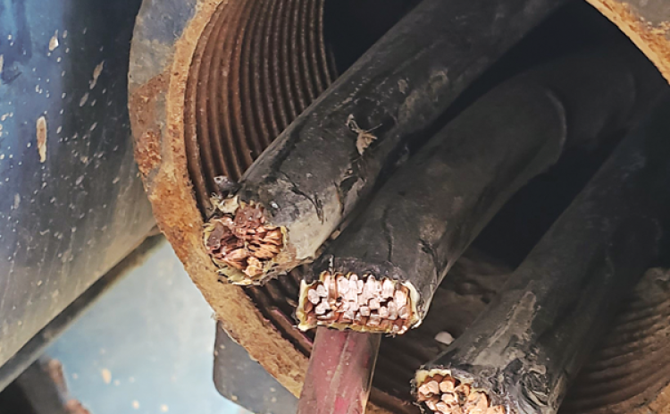 Wire cut at a water well pump. (Acadia Parish Sheriff’s photo)
