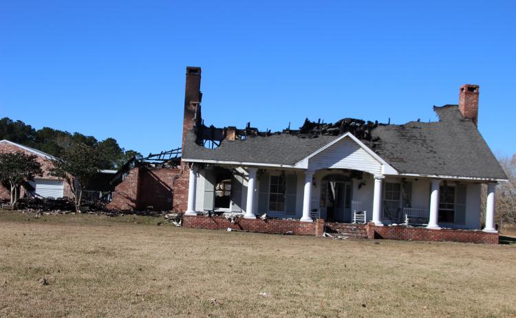 Fire destroys home on Dan Drive. (Photo by Myra Miller)
