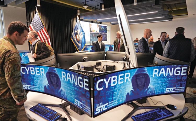 Attendees tour the new Joint Cyber Range and Training Center during the ribbon cutting ceremony for the facility located on the Water Campus in Baton Rouge on Feb. 1. This state-of-the-art facility is designed to meet the current and future training needs for the Louisiana National Guard’s Cyber Protection Team, state and local cyber first responders, and industry partners. (U.S. Army National Guard photo by Sgt. 1st Class Denis B. Ricou)