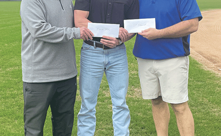 Eunice High and St. Edmund baseball head coaches Scott Phillips and Nick Trosclair are pictured with Perry Pitre Ford’s Perry Pitre as the schools prepare to co-host Saturday’s Perry Pitre Ford Jamboree at their home baseball fields. (Photo by Casey Charlie)