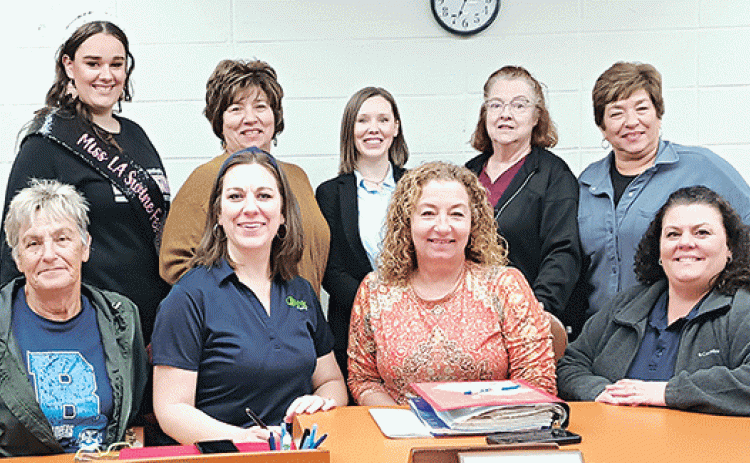 The La. Swine Festival Association elected its officers and board members recently following their meeting held at Basile Town Hall.  They are, from left, seated, Janice Ashford, Josie Laird, Madeline James-Battles and Melissa Bergeron Clavier. Standing, from left, are Lacey Lemmons, Janell Ashford, Evangeline Parish Tourism director Elizabeth West, Susie Lopez and Cindy Smith. Not pictured is Patricia Spears. (Photo by Darrel LeJeune/The Basile Weekly)