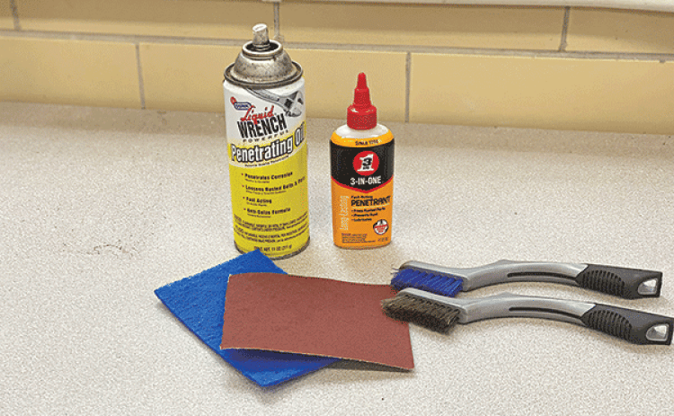 Brushes, scouring pads, sandpaper and lubricating oils are best for hand pruner maintenance. (Photos by Heather Kirk-Ballard/LSU AgCenter)