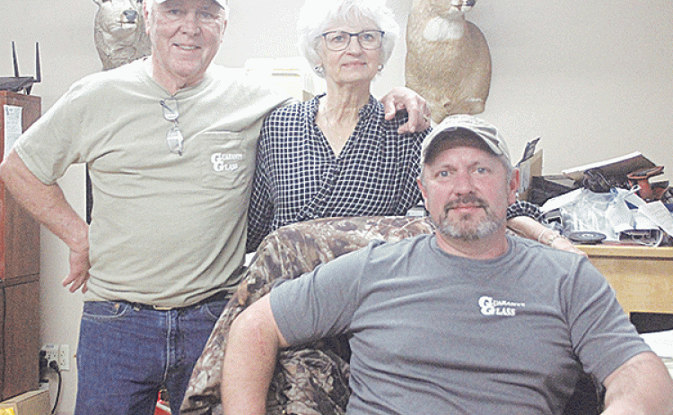 Standing, from left, are Richard and Carrol Lafleur, and seated is their son Chad. The three are owners of Guaranty Glass, with locations in Opelousas, Ville Platte, and Church Point. (Ville Platte Gazette photo by Tony Marks)