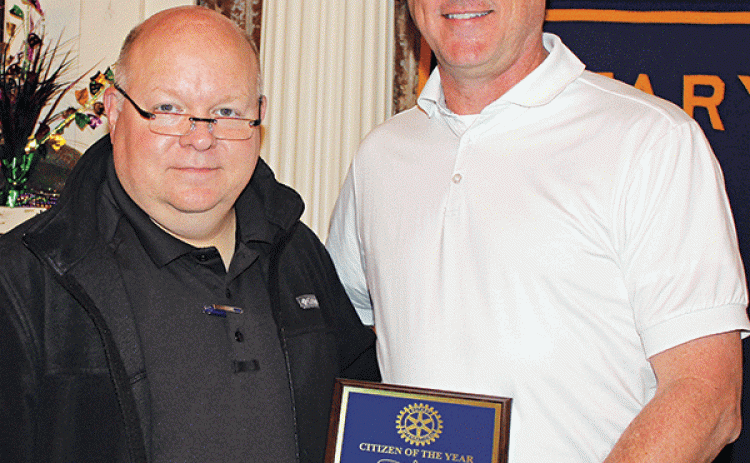 Dwight Jodon, right, was presented the Eunice Rotary Club’s Citizen of the Year Award on Wednesday. Rotarian Van Reed made the presentation. (Photo by Myra Miller)