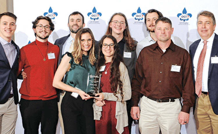 UL Lafayette students’ “House of Cards” artist’s retreat was recently recognized with two awards during a Louisiana Chapter of the American Concrete Institute awards ceremony in New Orleans. Attending the event were, from left to right, students Hunter Darby, Samuel Pierce, David Nelson, Lexi Palumbo, Lindsey Authement, Matthew Dufrene, Christian Willis, Jason Funderburgh, and architecture professor Geoff Gjertson. Submitted photo