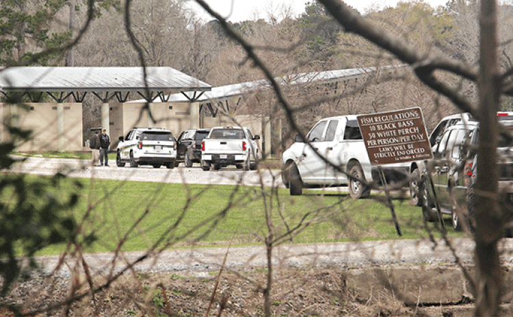 The Eunice City Lake was the focus of an intense search on Tuesday for a missing woman’s body, but the body was eventually found off La. 10 near Beggs. The investigation was led by the St. Landry Parish Sheriff’s Office. The search at the City Lake was from about 7 a.m. to 4 p.m. (Photo by Harlan Kirgan)