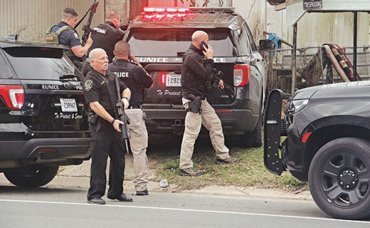 A Eunice man was the subject of a search of two residences in the 300 block of Aymond Street on Thursday morning. Eunice Police, Marshals and State Police were involved in the search. for Theobegi Levier, 30. (Photo by Harlan Kirgan)